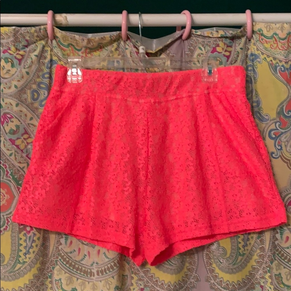 Free people lined hot pink lace shorts.
